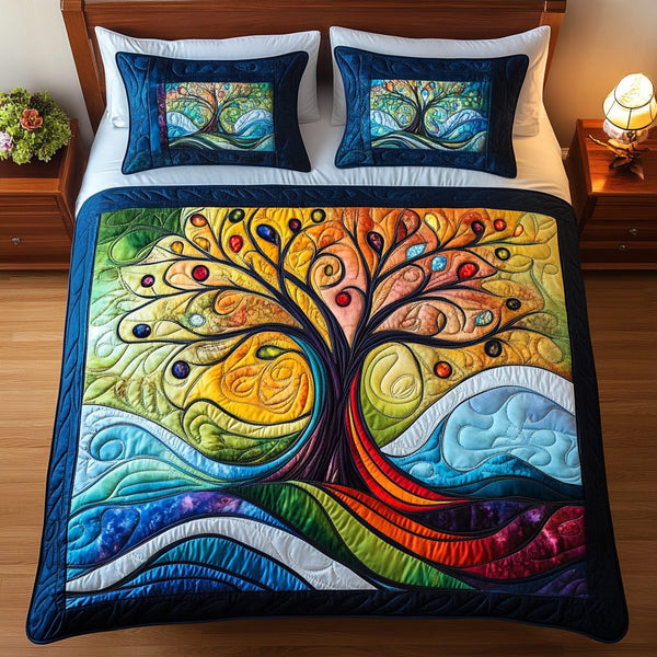 Dreamscape Grove quilted 3-piece bedding set on a made bed with two matching pillow shams