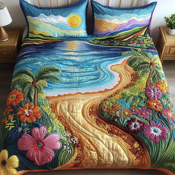 Dreamy Blooms quilted 3-piece bedding set on a made bed with two matching pillow shams