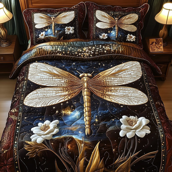 Dreamy Dragonfly quilted 3-piece bedding set on a made bed with two matching pillow shams