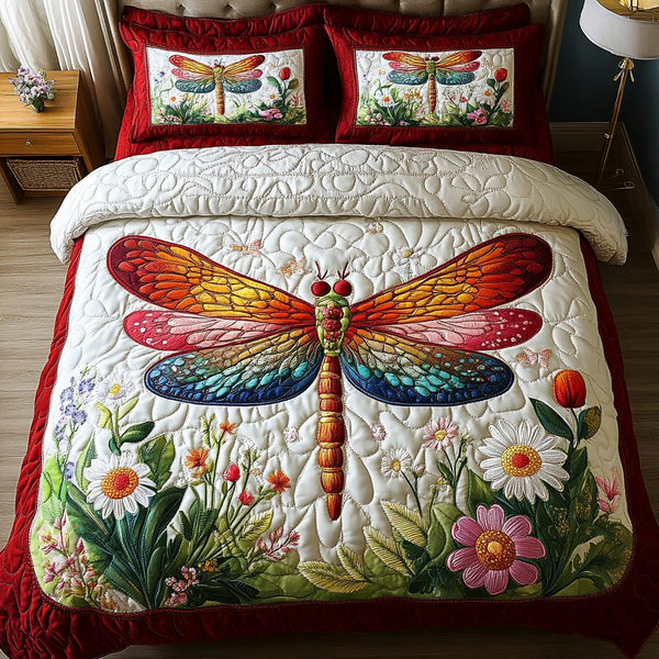 Dreamy Dragonfly quilted 3-piece bedding set on a made bed with two matching pillow shams