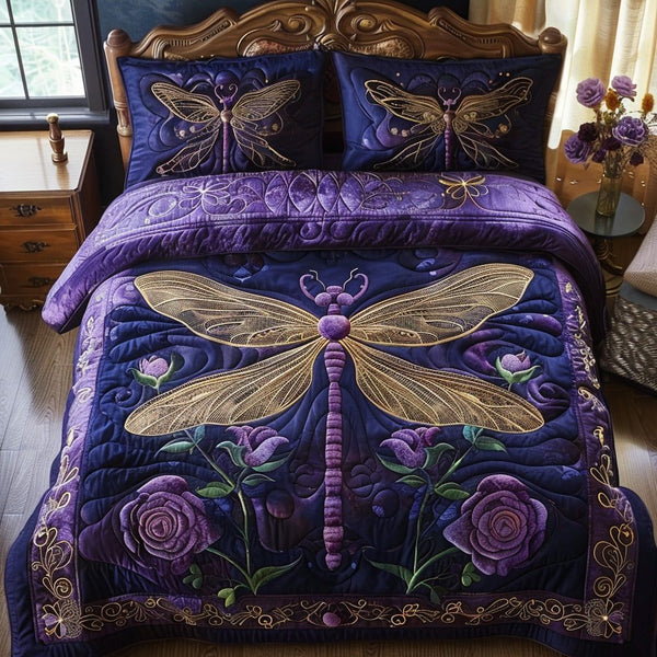 Dreamy Dragonfly quilted 3-piece bedding set on a made bed with two matching pillow shams