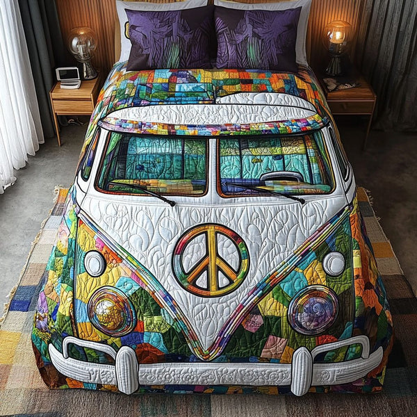 Dreamy Drifter quilted 3-piece bedding set on a made bed with two matching pillow shams