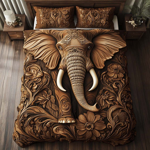 Dreamy Elephant quilted 3-piece bedding set on a made bed with two matching pillow shams