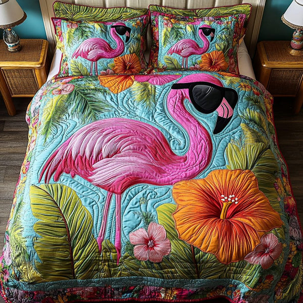 Dreamy Flamingo quilted 3-piece bedding set on a made bed with two matching pillow shams