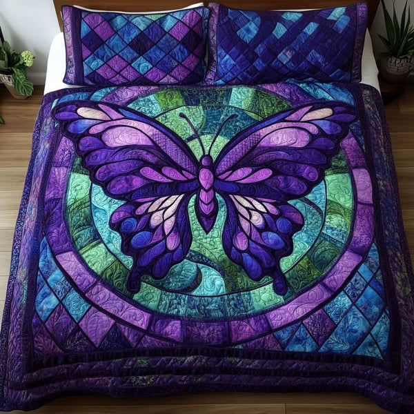 Dreamy Flight quilted 3-piece bedding set on a made bed with two matching pillow shams