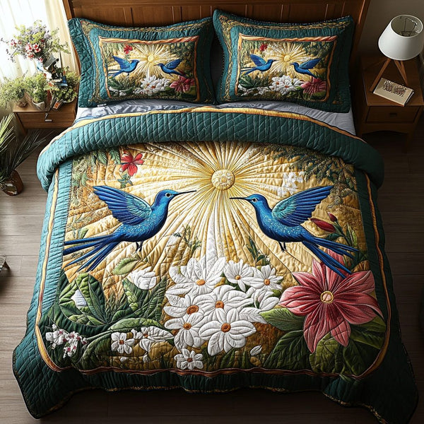 Dreamy Hummers quilted 3-piece bedding set on a made bed with two matching pillow shams
