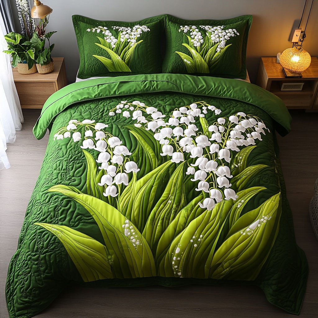 Dreamy Lily quilted 3-piece bedding set on a made bed with two matching pillow shams