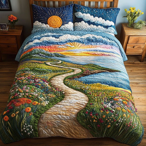 Dreamy Valley Escape quilted 3-piece bedding set on a made bed with two matching pillow shams