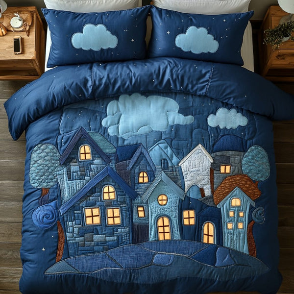Dreamy Village quilted 3-piece bedding set on a made bed with two matching pillow shams