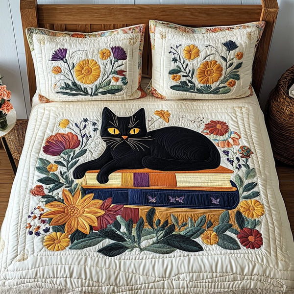 Dreamy Whiskers quilted 3-piece bedding set on a made bed with two matching pillow shams