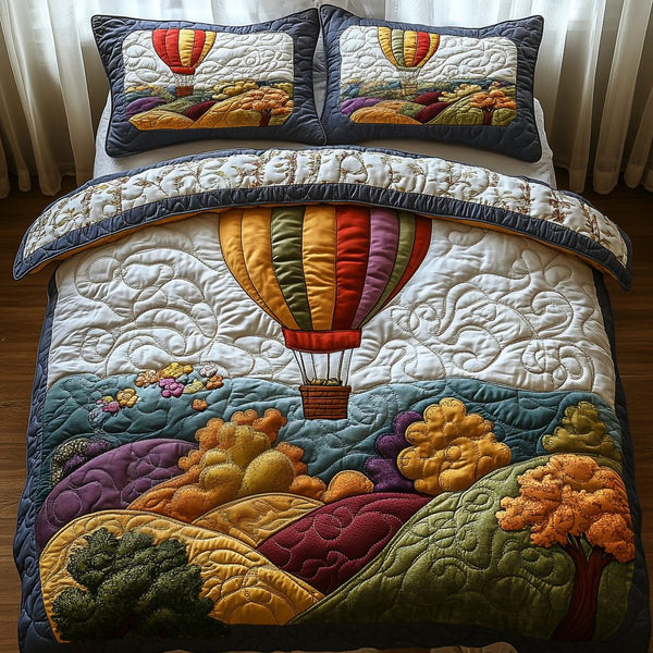 Drifting Horizons quilted 3-piece bedding set on a made bed with two matching pillow shams