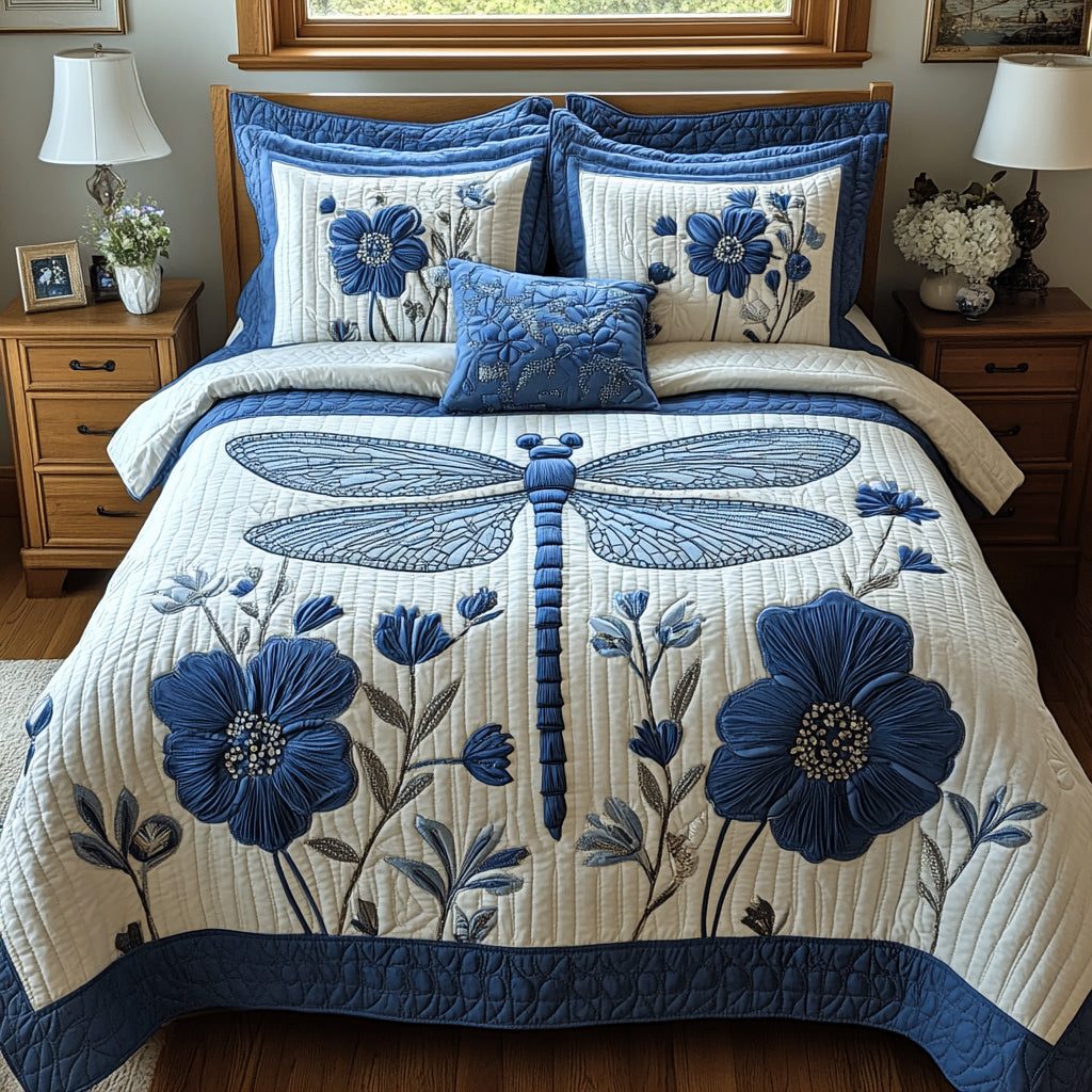 Drifting Wings quilted 3-piece bedding set on a made bed with two matching pillow shams