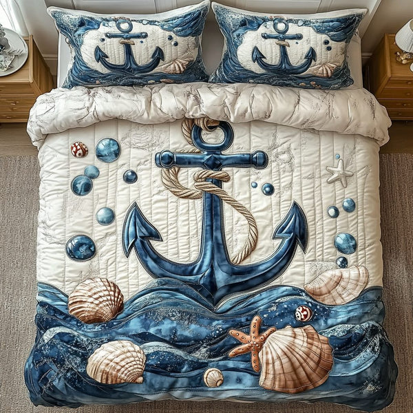 Driftwood Dreams quilted 3-piece bedding set on a made bed in a light coastal bedroom