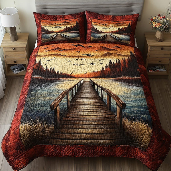 Driftwood Rest quilted 3-piece bedding set on a made bed in a light coastal bedroom