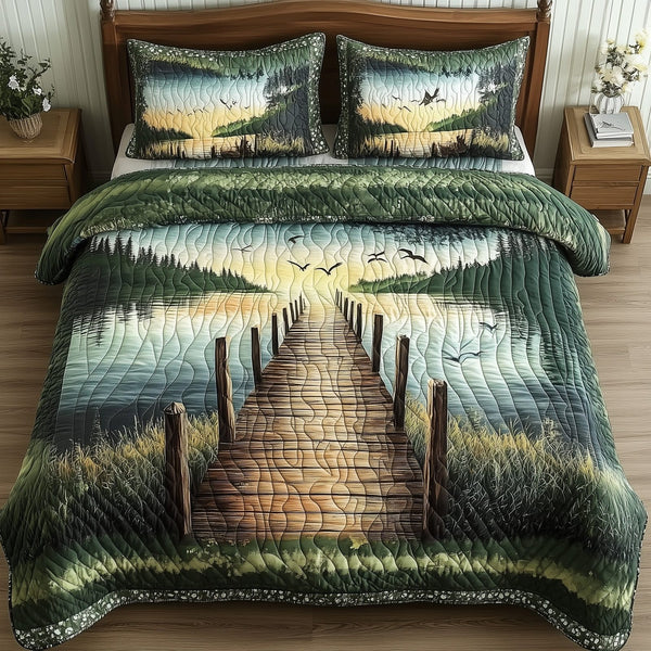 Driftwood Rest quilted 3-piece bedding set on a made bed in a light coastal bedroom