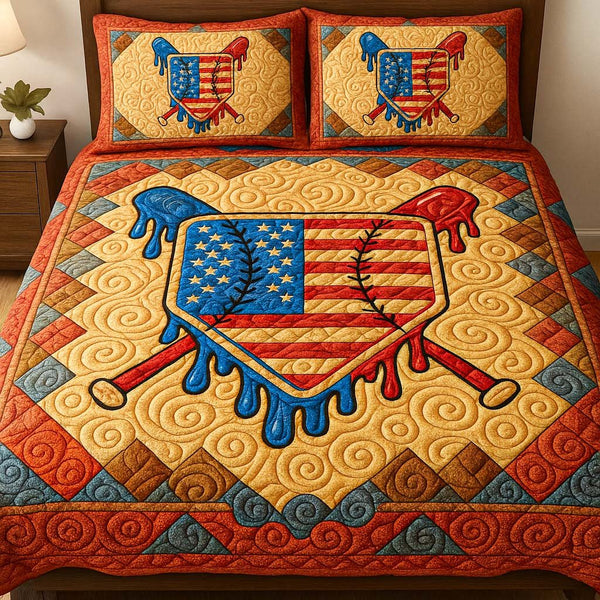 Dripping Diamond Pride quilted 3-piece bedding set on a made bed with two matching pillow shams