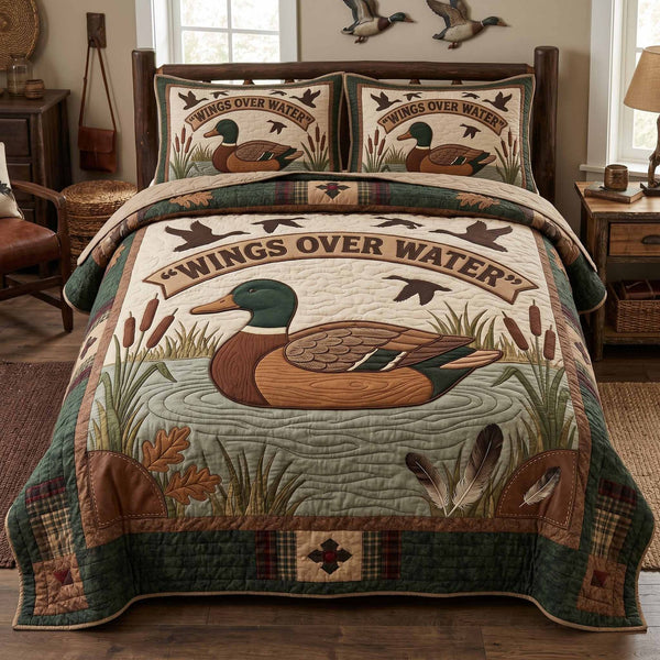 Duck Cabin quilted 3-piece bedding set on a made bed with two matching pillow shams
