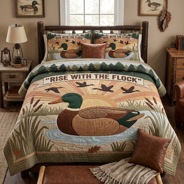 Duck Flight quilted 3-piece bedding set on a made bed with two matching pillow shams