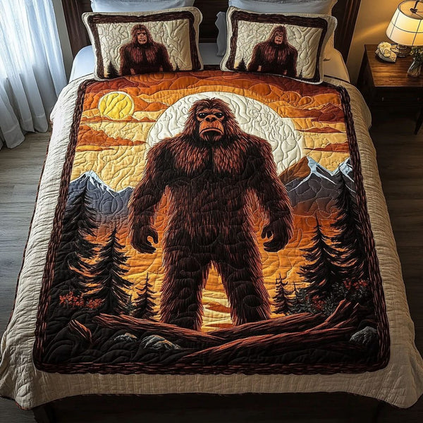 Dusk Watcher quilted 3-piece bedding set on a made bed with two matching pillow shams