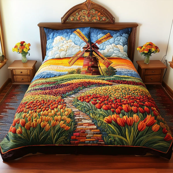 Dutch Delight quilted 3-piece bedding set on a made bed with two matching pillow shams
