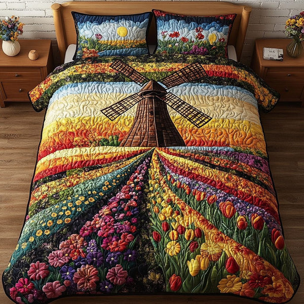 Dutch Sunrise quilted 3-piece bedding set on a made bed with two matching pillow shams