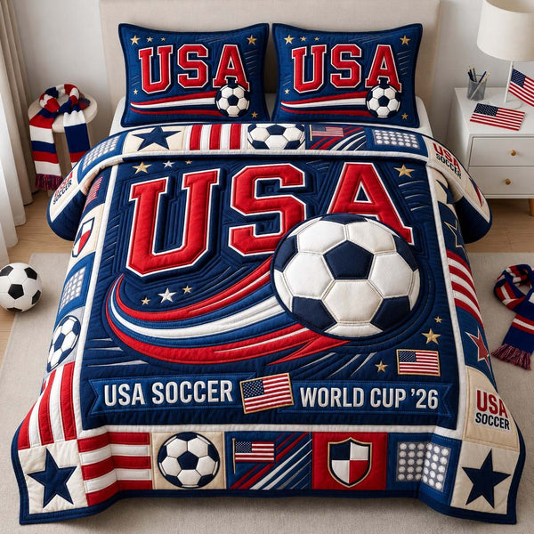 Dynamic Soccer Wave quilted 3-piece bedding set on a made bed in a light coastal bedroom