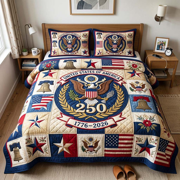 Eagle Crest quilted 3-piece bedding set on a made bed in a warmly lit bedroom