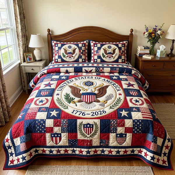 Eagle Crest quilted 3-piece bedding set on a made bed in a warmly lit bedroom