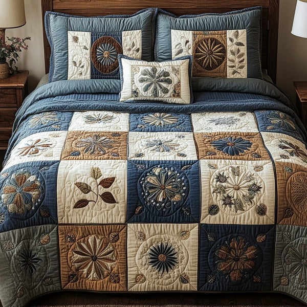 Earth Harmony quilted 3-piece bedding set on a made bed with two matching pillow shams