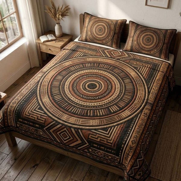 Earth Mandala quilted 3-piece bedding set on a made bed with two matching pillow shams