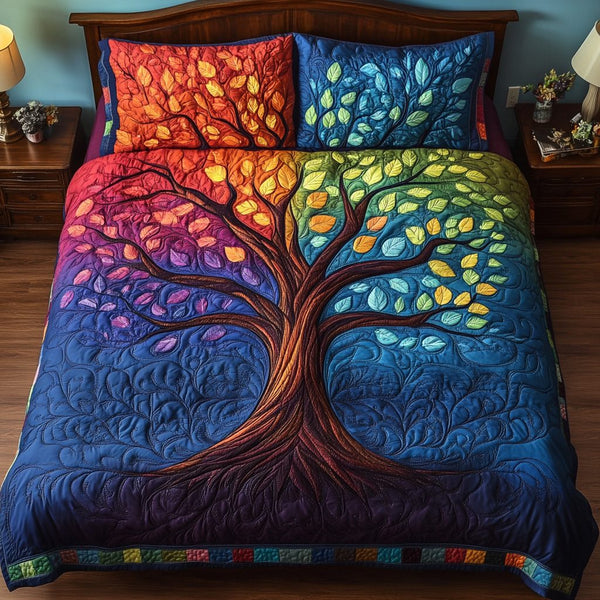 Earth Roots quilted 3-piece bedding set on a made bed with two matching pillow shams