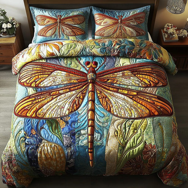 Earth Whirl quilted 3-piece bedding set on a made bed with two matching pillow shams