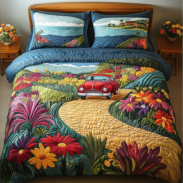Earthbound Bliss quilted 3-piece bedding set on a made bed with two matching pillow shams