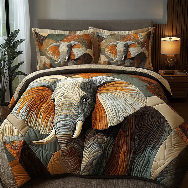 Earthbound Journey quilted 3-piece bedding set on a made bed with two matching pillow shams