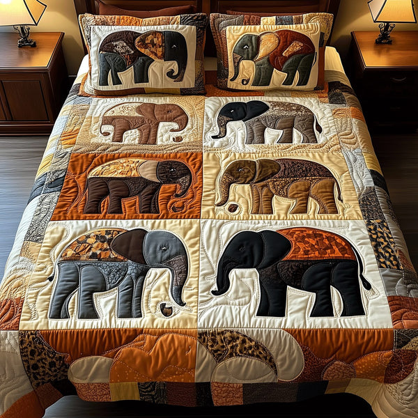 Earthy Elephant Bliss quilted 3-piece bedding set on a made bed with two matching pillow shams