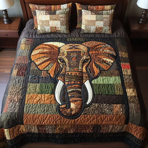 Earthy Guardian quilted 3-piece bedding set on a made bed with two matching pillow shams