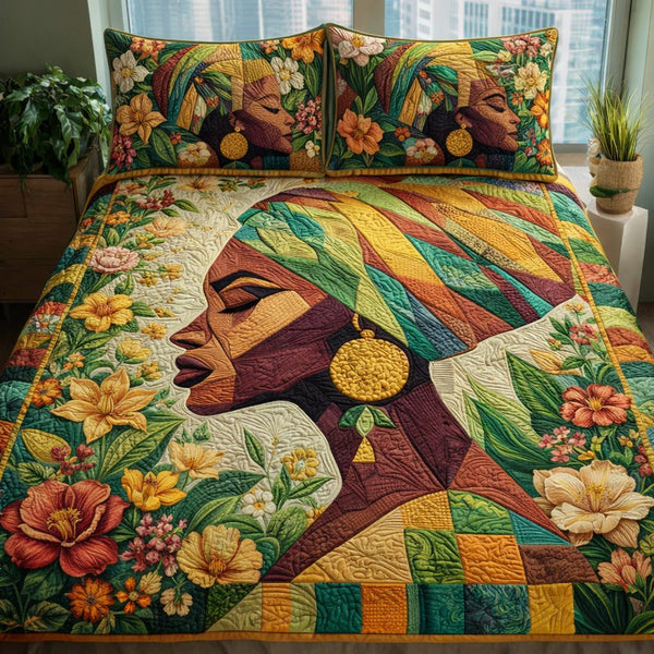 Earthy Queen Essence quilted 3-piece bedding set on a made bed with two matching pillow shams
