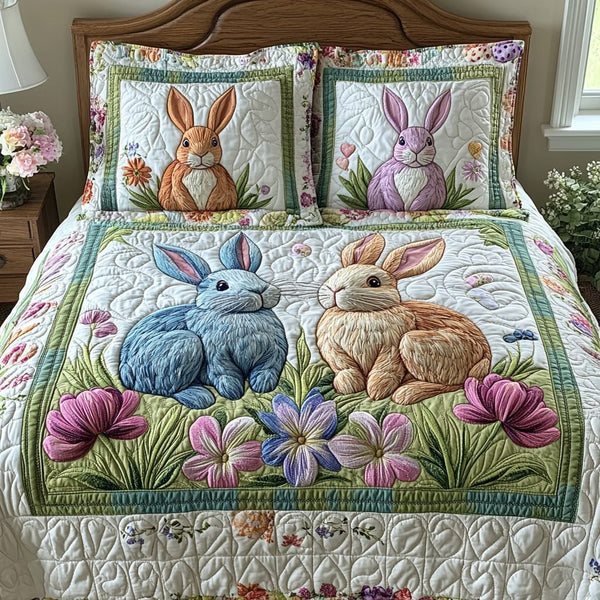 Easter Bunnies quilted 3-piece bedding set on a made bed with two matching pillow shams
