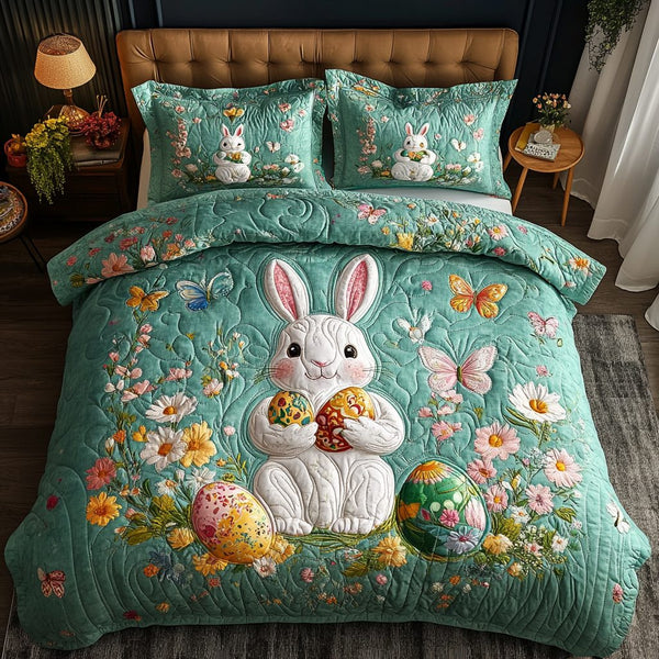 Easter Charm quilted 3-piece bedding set on a made bed with two matching pillow shams