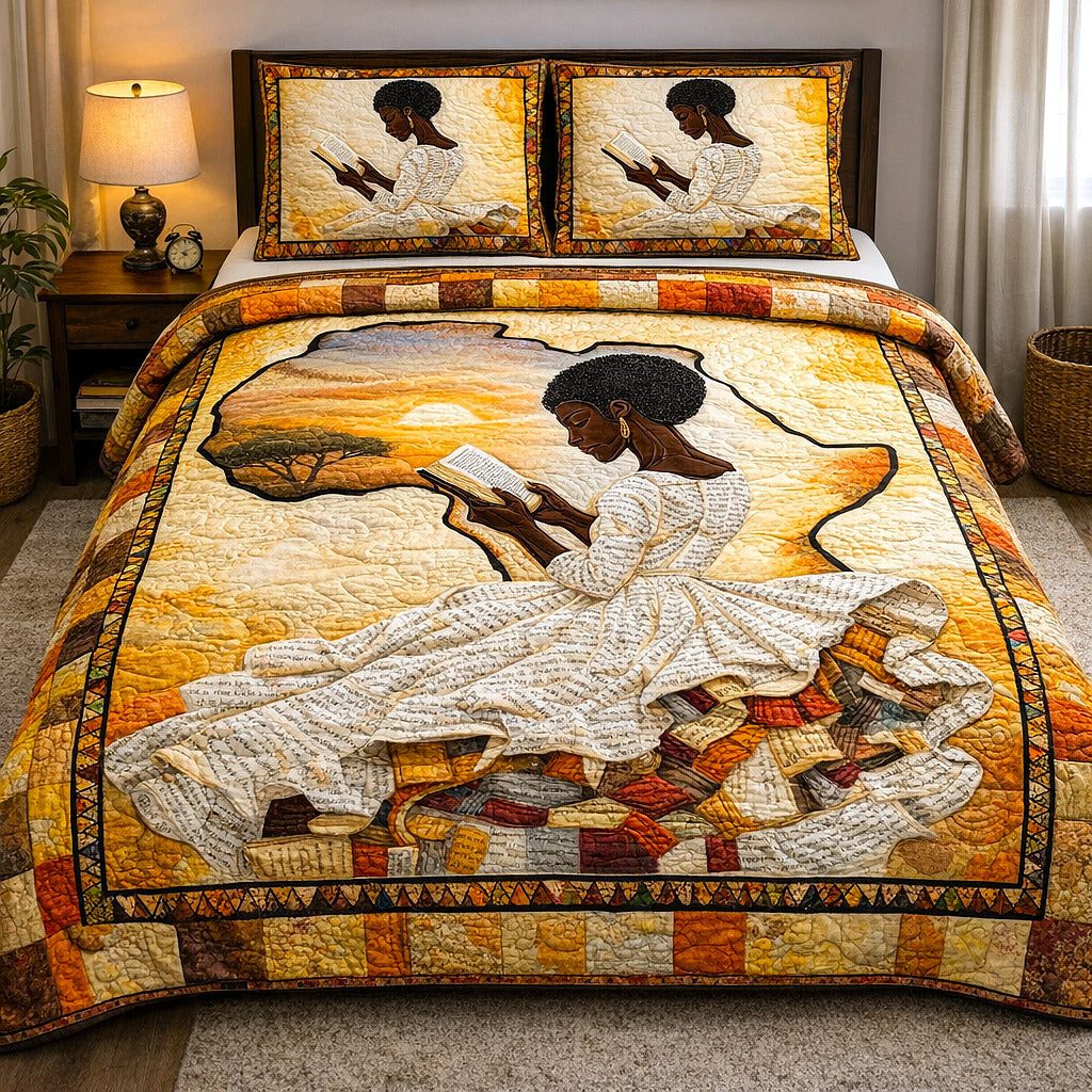 Ebony Glow quilted 3-piece bedding set on a made bed with two matching pillow shams