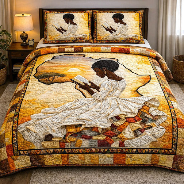 Ebony Glow quilted 3-piece bedding set on a made bed with two matching pillow shams