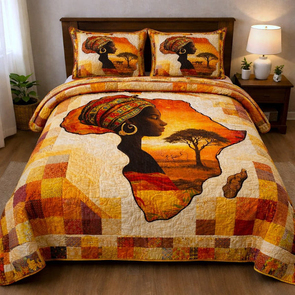 Ebony Glow quilted 3-piece bedding set on a made bed with two matching pillow shams