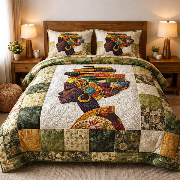 Ebony Glow quilted 3-piece bedding set on a made bed with two matching pillow shams