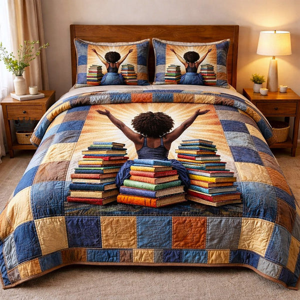 Ebony Glow quilted 3-piece bedding set on a made bed with two matching pillow shams