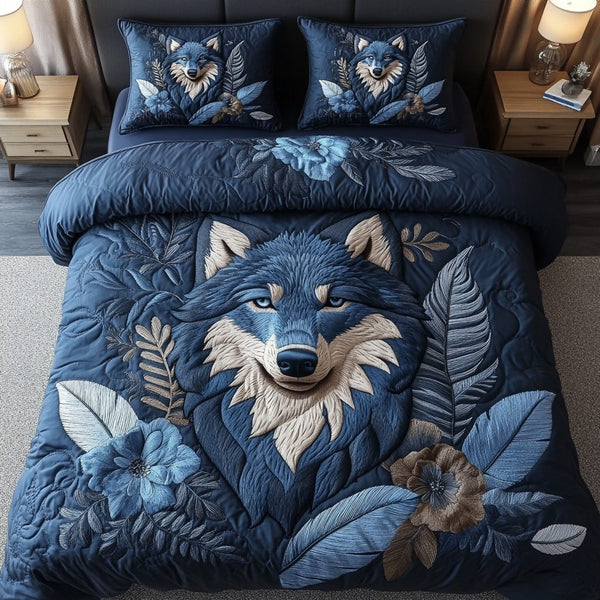 Echoed Mist quilted 3-piece bedding set on a made bed with two matching pillow shams