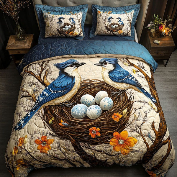 Egg Nest Jays quilted 3-piece bedding set on a made bed with two matching pillow shams