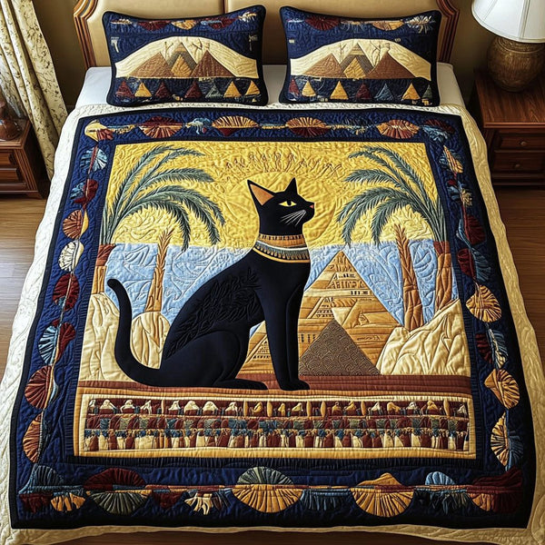 Egyptian Cat Elegance quilted 3-piece bedding set on a made bed with two matching pillow shams
