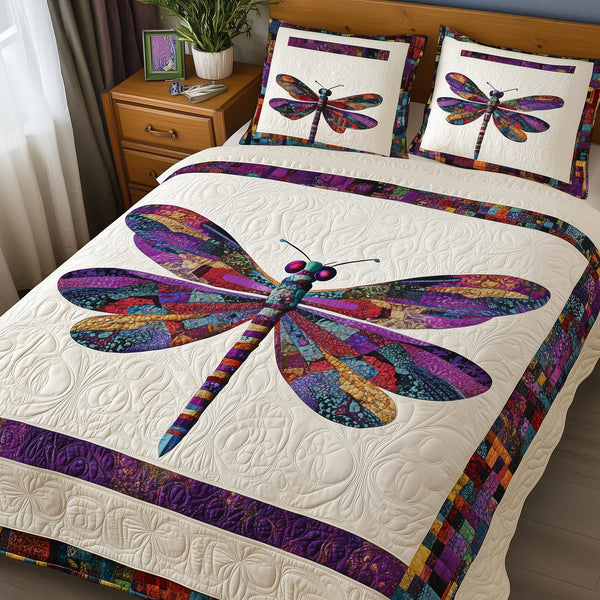 Elegance Dragonfly quilted 3-piece bedding set on a made bed with two matching pillow shams