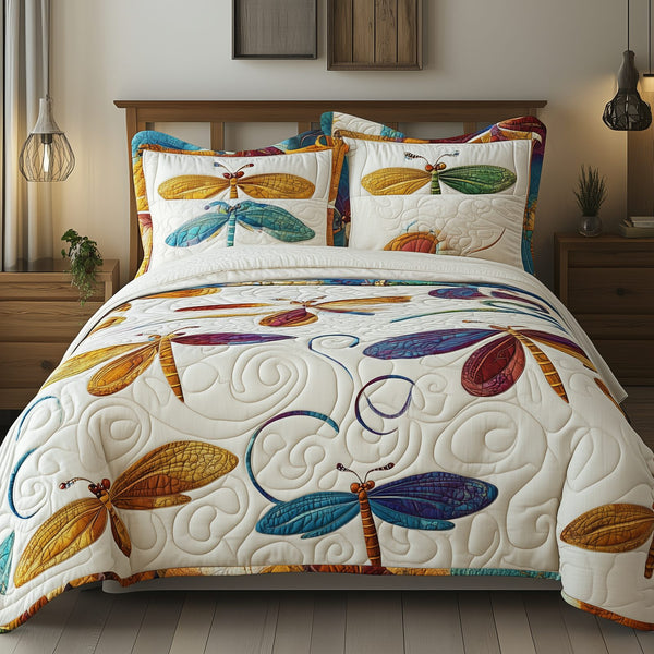 Elegance Dragonfly quilted 3-piece bedding set on a made bed with two matching pillow shams