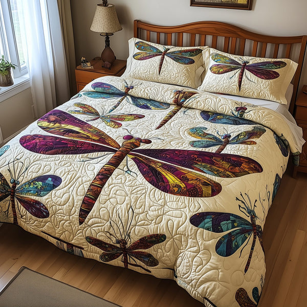 Elegance Dragonfly quilted 3-piece bedding set on a made bed with two matching pillow shams
